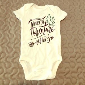 “And so the Adventure Begins” onesie